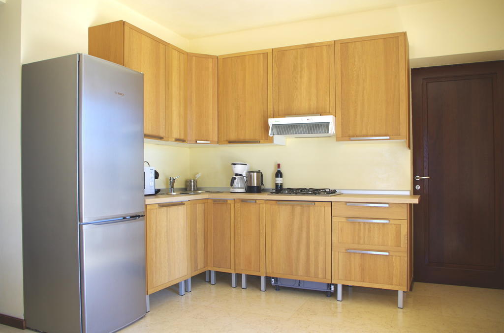 Aparthotel Antico Casale Tiravento Passignano sul Trasimeno Habitación foto