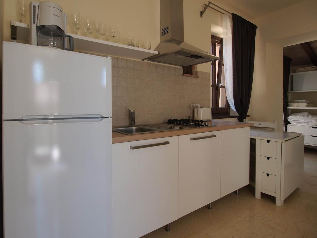Aparthotel Antico Casale Tiravento Passignano sul Trasimeno Habitación foto