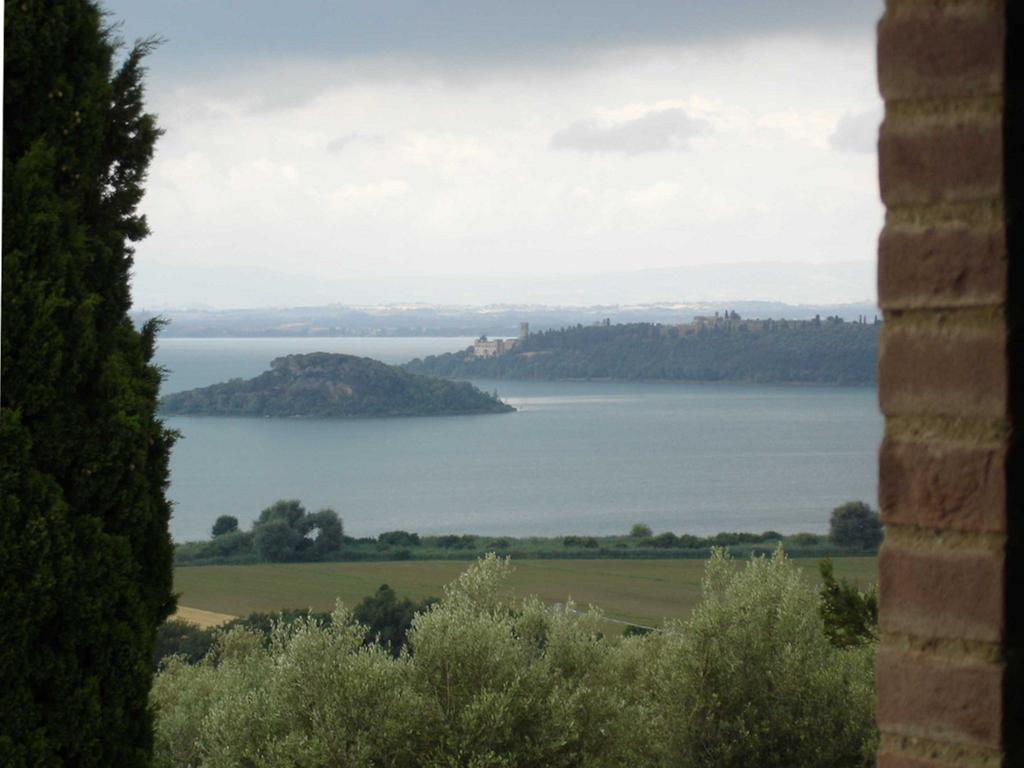 Aparthotel Antico Casale Tiravento Passignano sul Trasimeno Habitación foto